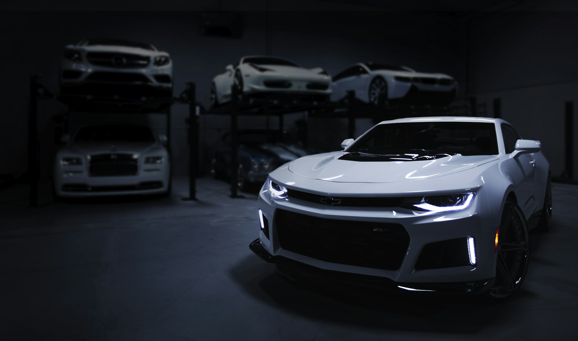Cars in dramatic dark lighting